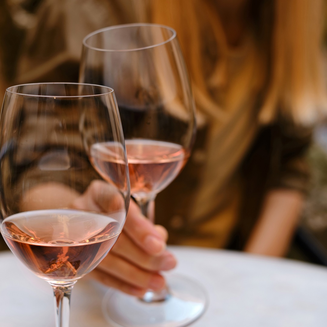 A Glass Of Rose Wine In The Hands Of A Girl Relaxing